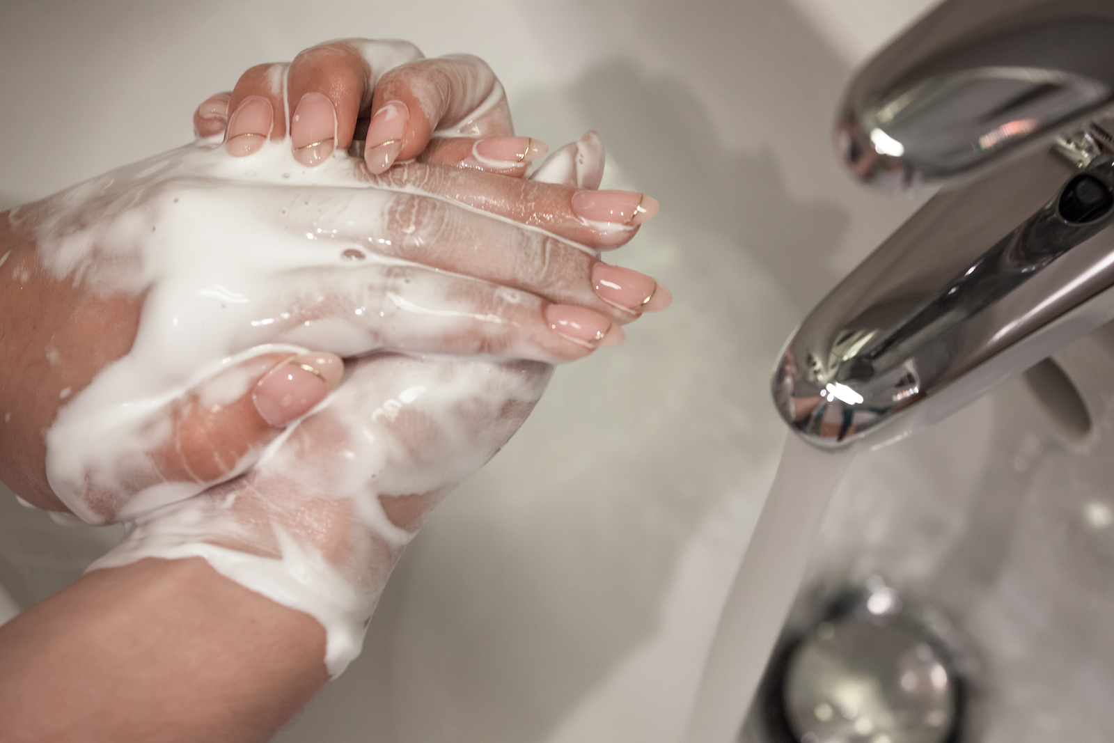 bigstock-Wash-Hands-Beautiful-Female-H-307412230